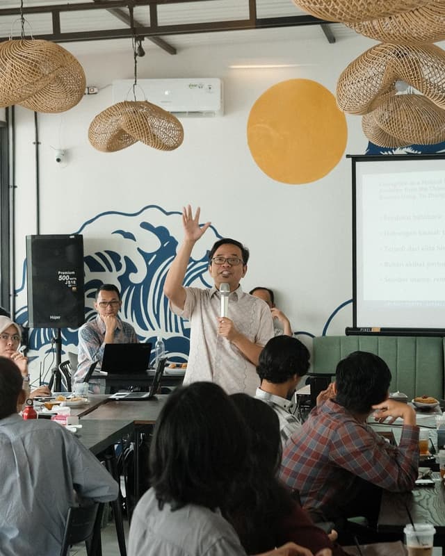 Workshop or community event gathering at Moikai